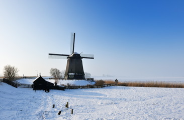 Beautiful winter windmill landscape