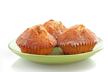 Three cupcakes on white background