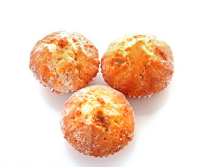 Three cupcakes on white background