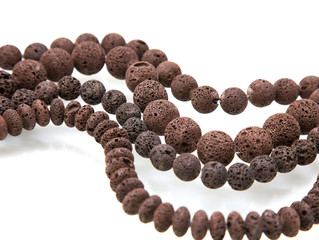 Lava beads; coffe-colored, small reflections a