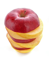 Sliced mixed fruit isolated on white close up