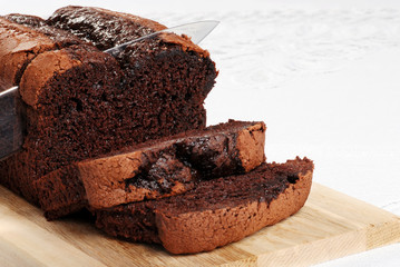 cutting slice belgium chocolate cake focus on knife tip