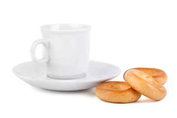 Cup on saucer with bagels