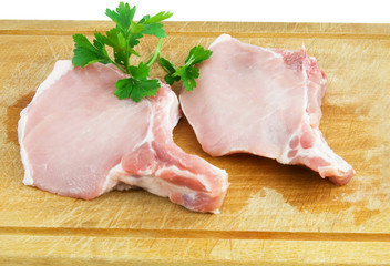 raw meat at wooden background