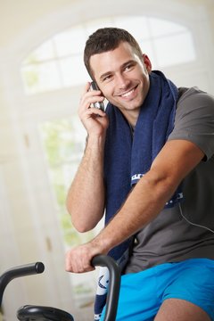 Man talking on mobile after training