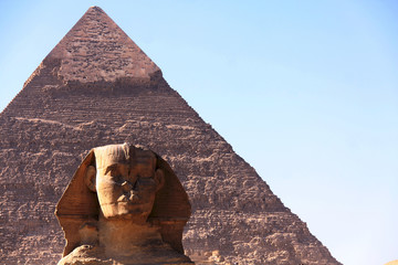 great ancient sculpture of egyptian sphinx and pyramid © Andrei Starostin