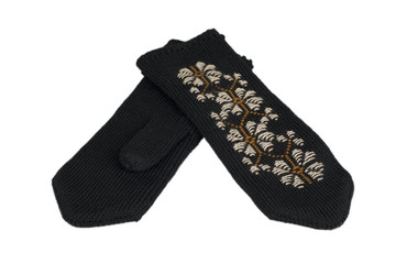 Female mittens knitting from a woolen yarn. Isolated