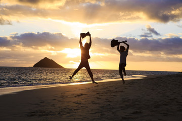 silhouette of twin brothers with drum and guitar
