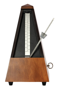 Mechanical Musicial Metronome on white background arm moving