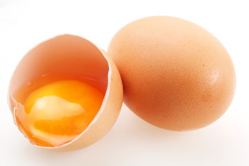 With brown eggs on a white background.