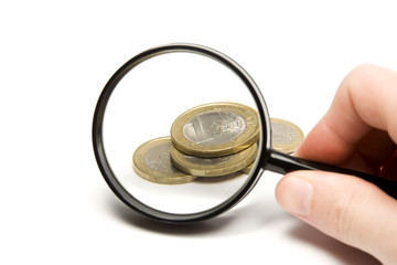 Concept of searching money - zoom tool and coin