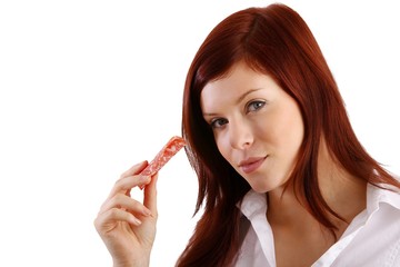 young woman with sausage (isolated)