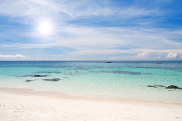 beach with white sand and sea