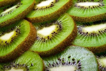 Crédence de cuisine en plexiglas Tranches de fruits Fond d& 39 une partie de kiwi par anneaux.