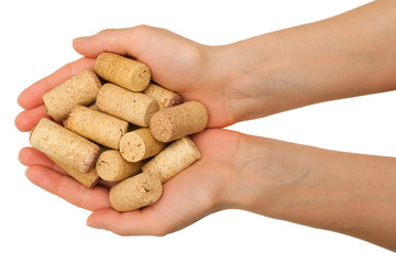 Hands with wine corks