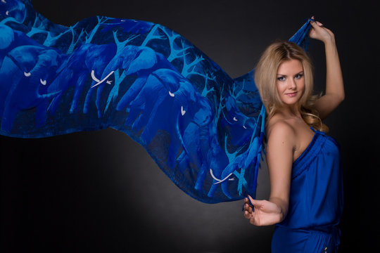 Closeup Portrait Of Fashion Woman With Blue Flying Scarf