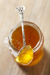 orange   thin cut marmalade or jam on a spoon