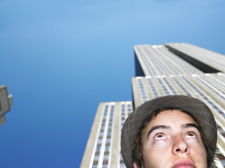 Young Man Under Skyscraper