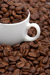 Coffee cup with coffee grains