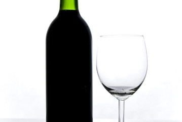 bottle of wine and wineglass isolated on white background