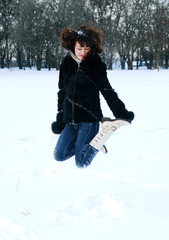 Young beautiful woman with snow