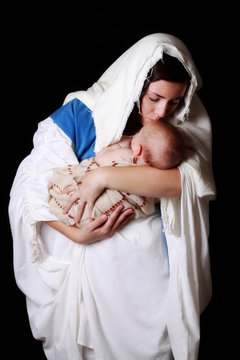 Mary kissing Jesus