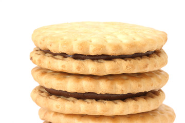 Stack of shortbread butter biscuits with chocolate filling