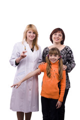 A doctor giving little girl an injection