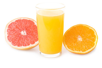 Glass of orange juice and sliced fruits