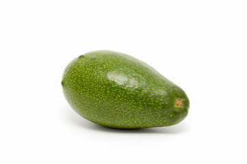 Avocado closeup isolated on a white background shadow below.