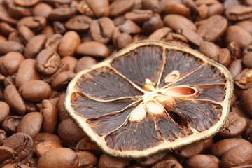 Coffee beans with citrus slice