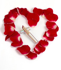 Lipstick inside rose petals heart