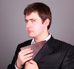 Boy hide note in jaket