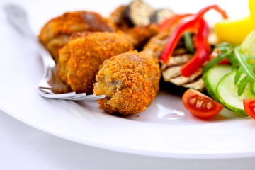 Breaded chicken with vegetables