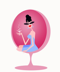 donna con martini seduta in una sedia di design