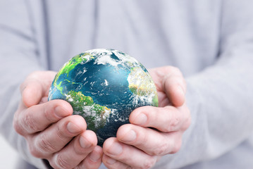 holding the planet earth