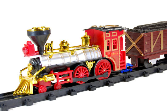 Toy Steam Train and and freight wagon on white background