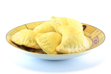 home made biscuit filled with marmalade isolated on white