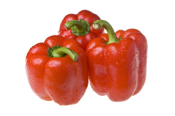 red juicy peppers on white background