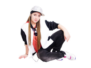 teen girl listening music by headphones over white background