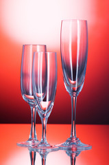 Wine glasses against colourful background