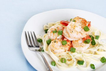 top view shrimp with noodles and fork