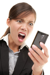 Funny businesswoman reading bad news text message