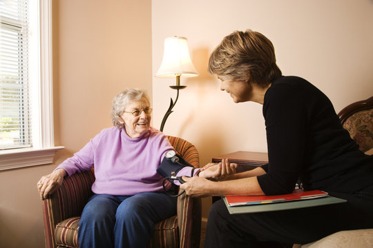 Elderly Woman Having Blood Pressure Taken