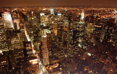 an aerial view of manhattan at night