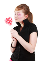 Portrait of beautiful girl with big lollipop