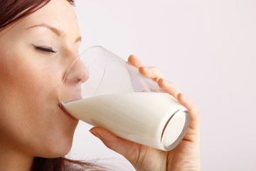 beautiful woman with a glass of milk
