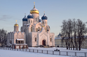 evening winter landscape with church.