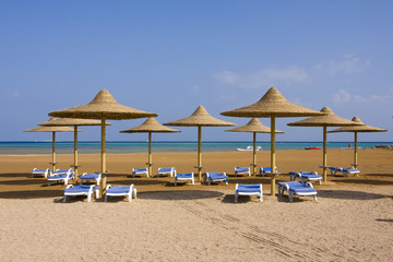 Beach on a sunny day. Hurghada city in Egypt.