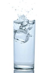 Ice falling in glass